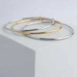 Ατσάλινο βραχιόλι 3 σε 1 σε διχρωμία- Golden Knot