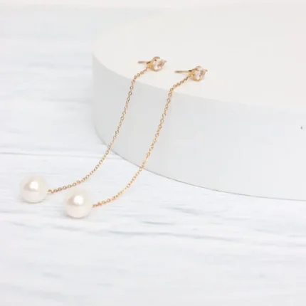 Επίχρυσα ατσάλινα κρεμαστά σκουλαρίκια που καταλήγουν σε πέρλα- Pearl Drops