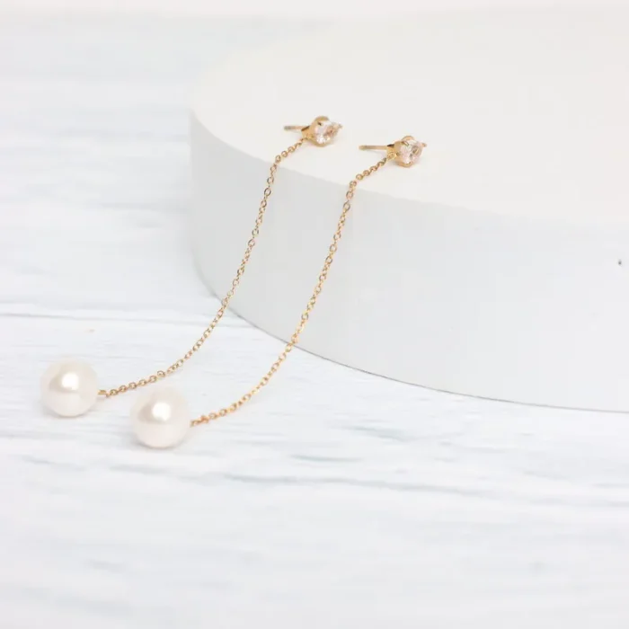 Επίχρυσα ατσάλινα κρεμαστά σκουλαρίκια που καταλήγουν σε πέρλα- Pearl Drops